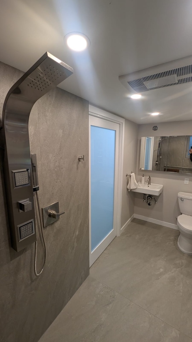 Accessible bathroom with custom railings in Richmond, BC