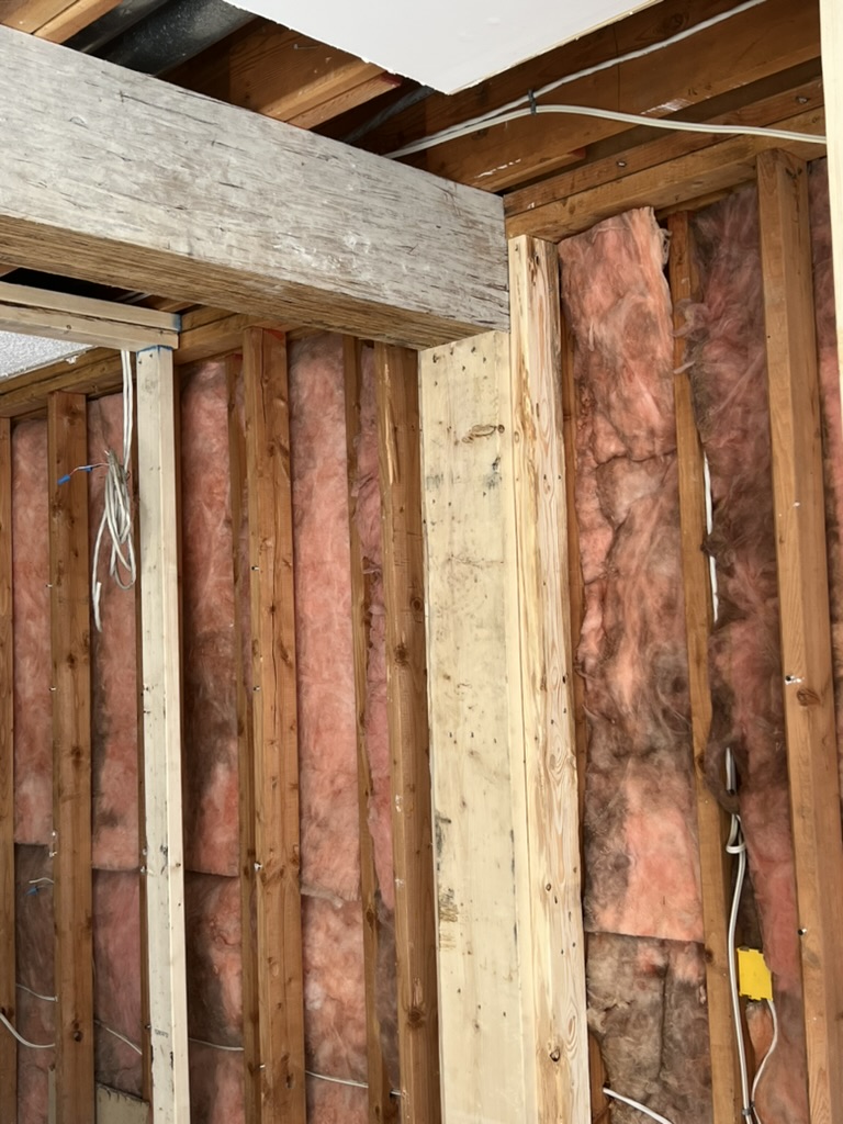 Structural beam installation in a North Vancouver home